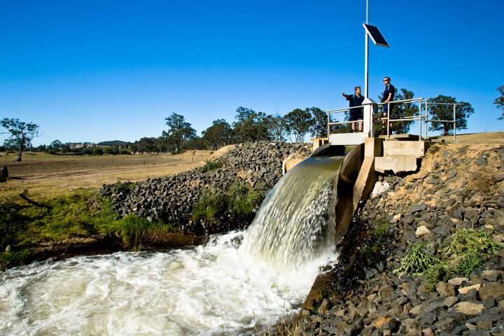 Water flowing from open gate